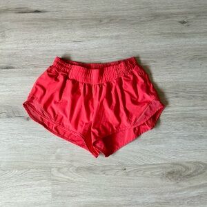Bright red colored lululemon hotty hot shorts
